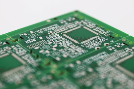 Multiplied printed circuit boards PCB isolated on the white background. PCB assembly. Close-up viewの写真素材