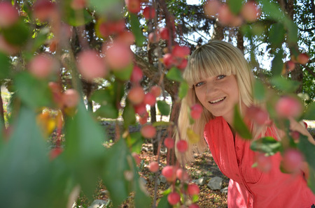 Young girl peeps out and smilingの写真素材