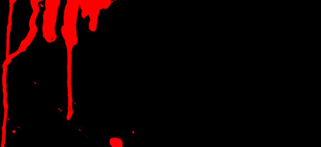 Splash of blood on black background. Concept of horror and Halloweenの写真素材