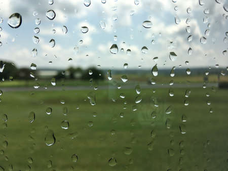Close-up of window with raindrops, autumn conceptの写真素材
