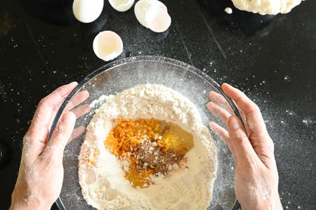 Bowl with ingredients to make pan de muertoの写真素材