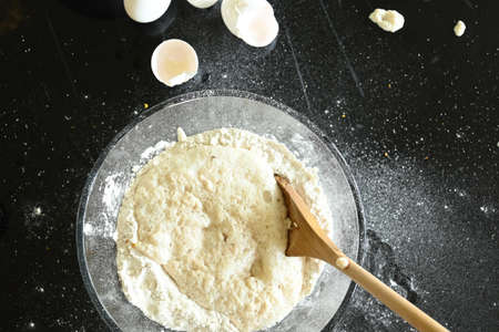 Mixing ingredients to make doughの写真素材