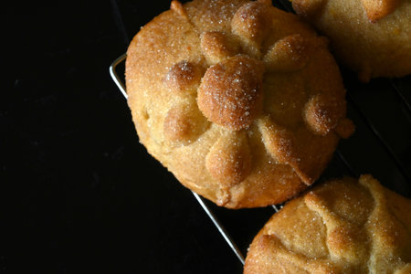 Close-up of pan de muerto on black background and copy spaceの写真素材