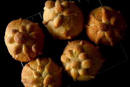 Overhead of traditional pan de muerto set on baking rackの写真素材