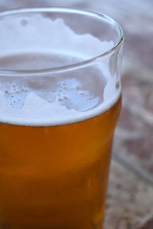 Selective focus of beer foam with copy spaceの写真素材