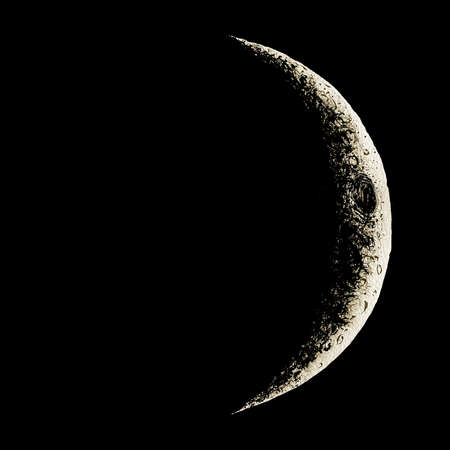 Crescent moon on black background.の写真素材