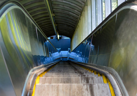 Escalator in a modern metro station, closeup of photo