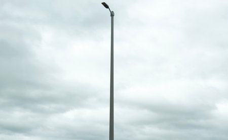 Street lamp on a cloudy sky background. Street lamp on cloudy sky background.の写真素材