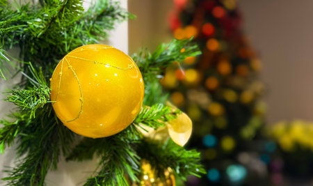 Christmas decoration on the christmas tree with bokeh background.の写真素材