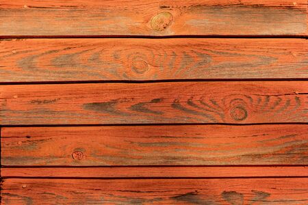 orange-pink wood texture with gray veins and knotsの写真素材
