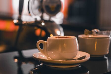 a cup of morning coffee at the barの写真素材