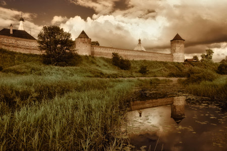 The wall and towers of Monastery of Saint Euthymius in warm colors. Suzdal. Russia