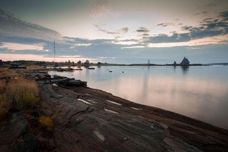 Early morning on White Sea. Landscape with traditional north church on island in Kem, Republic of Karelia, Russiaの写真素材