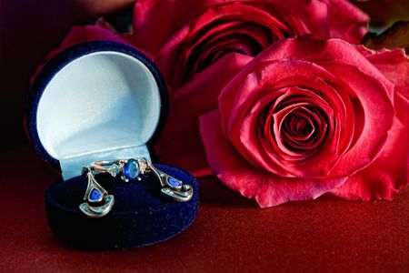 Sapphire jewelrys and red roseの写真素材