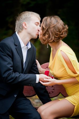 Young couple on date in an autumn parkの写真素材