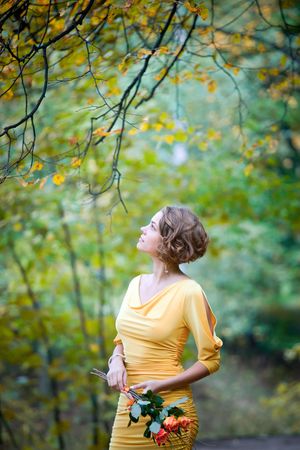 Young couple on date in an autumn parkの写真素材