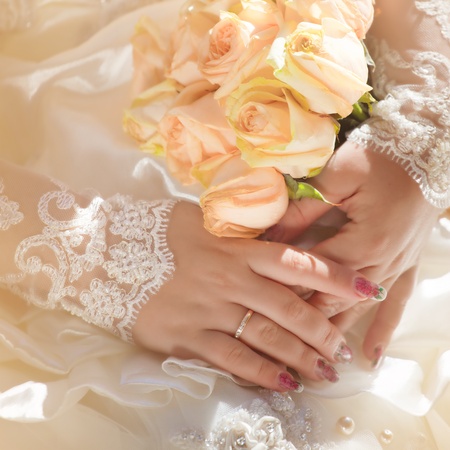 Newlyweds hands with wedding rings.の写真素材