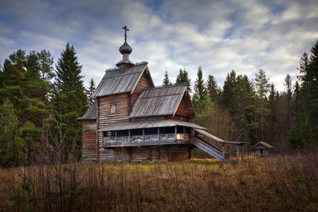 Wooden christian Church in forest の写真素材