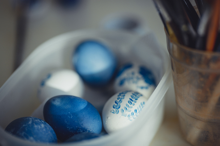 The Easter eggs paintings on white desk at homeの写真素材