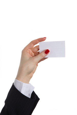 Woman hand giving business card in office.の写真素材