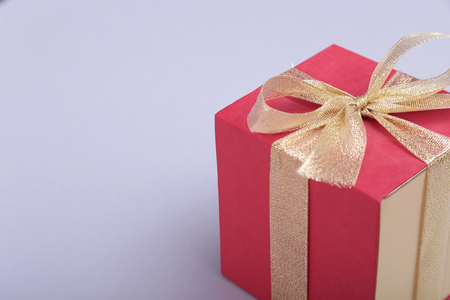 Gift boxes with bow on wood background.の写真素材