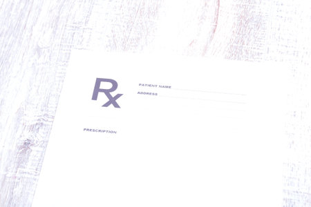 Closeup of stethoscope on a rx prescription.