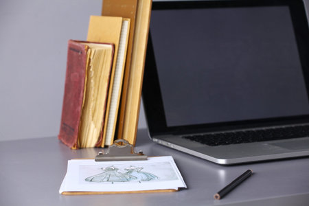 Workspace with computer and documents in office .