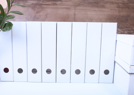 File folder with documents and important document on isolated backgroundの写真素材