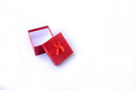 Open gift boxes with bow on wood background. Christmas Decoration.の写真素材