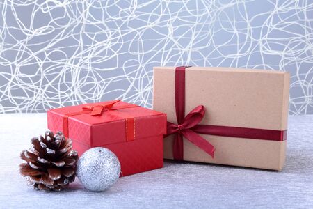 Christmas background with decorations and gift boxes on wooden board.の写真素材