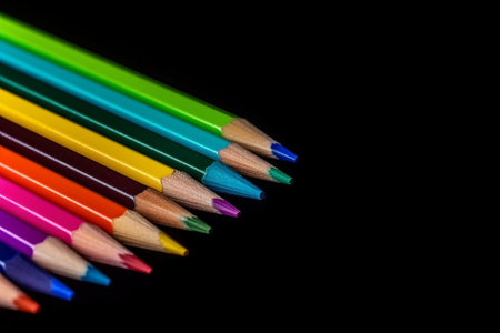 Near of rainbow coloured pencils with duplicate space on dim foundation. Creative resource, AI Generatedの素材