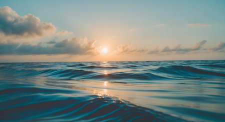 AI Generated. Sun Glimmering on Rippling Ocean Water at Duskの素材