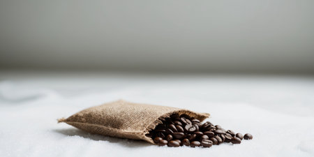 AI Generated. A bag of coffee beans is displayed on a white surfaceの素材