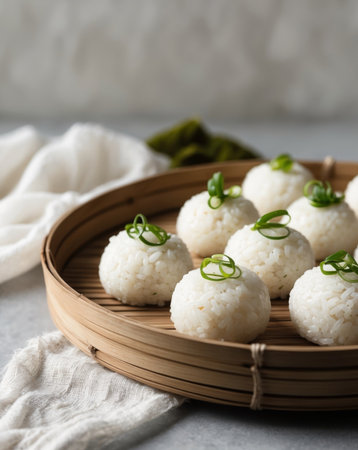 AI Generated. Closeup of steamed rice balls with scallions on a bamboo trayの素材