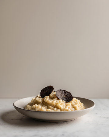 AI Generated. Creamy risotto with black truffle slicesの素材