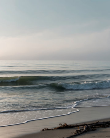 AI Generated. Tranquil Ocean Waves with Soft Light Reflections for Relaxation and Travel Imageryの素材