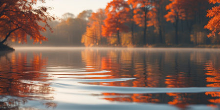 AI Generated. Soft ripples create a serene atmosphere on the calm lake surface during autumnの素材