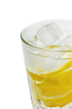 Water with lemons and ice cube isolated (selective focus)の写真素材