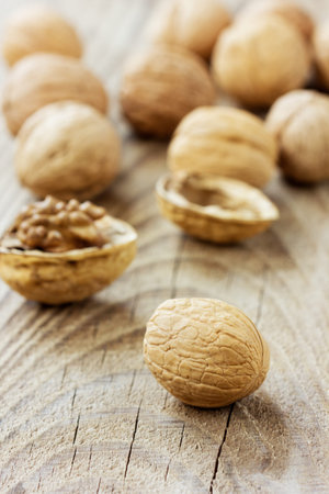 Walnuts on a wooden rustic board