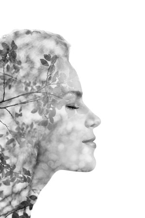 creative portrait of beautiful young woman made from double exposure effect using photo of nature,...
