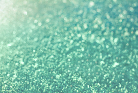 snow background in vintage toning, christmas light bokeh backdropの写真素材