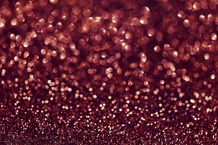 Magic Christmas bokeh background in purple color. Abstract holiday backdrop.の写真素材