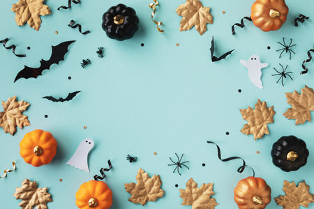 Halloween holiday frame with party decorations of pumpkins, bats, ghosts, spiders on blue background...