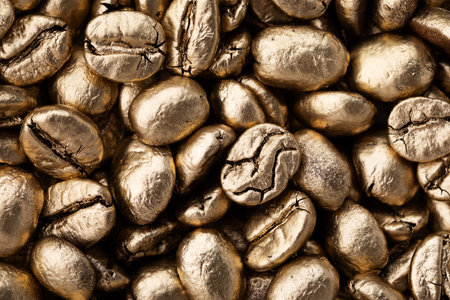 Golden coffee beans background.の写真素材