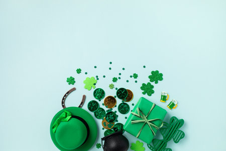 Patrick Day festive background with green decoration top view. Irish national holiday greeting card or party invitation concept.の写真素材