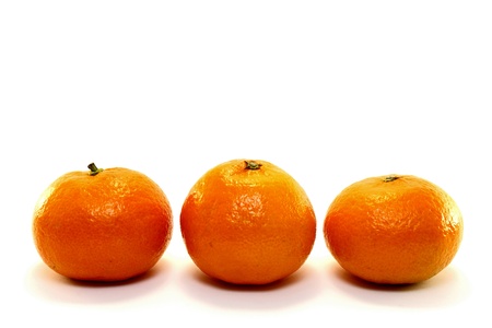 Three natural tangerine on white backgroundの写真素材