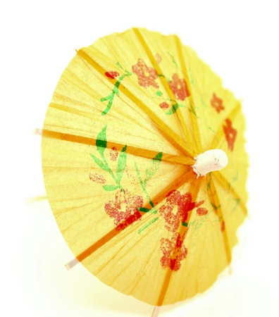 Yellow cocktail umbrellaの写真素材