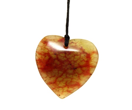 	A beautiful stone heart on a white backgroundの写真素材