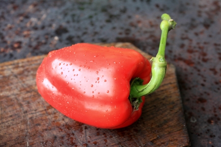 red pepper on a wooden backgroundの写真素材