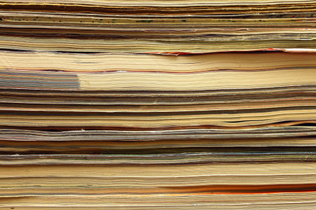Magazines stack close-up, abstract background